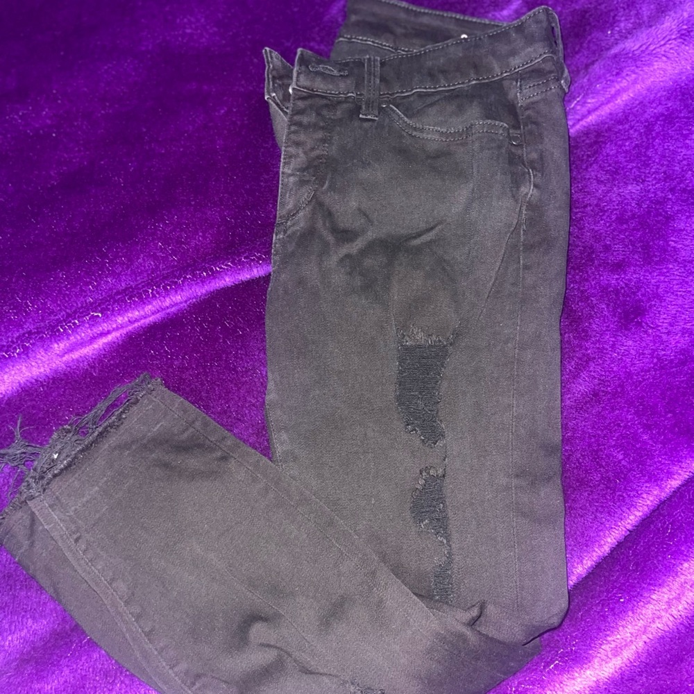 Black jeans with a little distressed